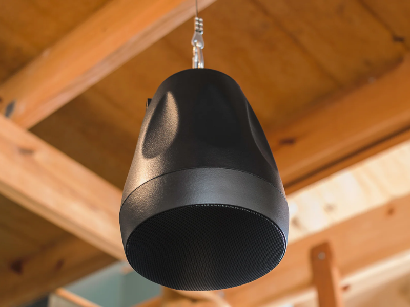 Pendant speaker hanging in a commercial space